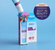 Dermal Therapy Lip Balm Berry tube standing beside its open carton on a blue background with an award badge graphic