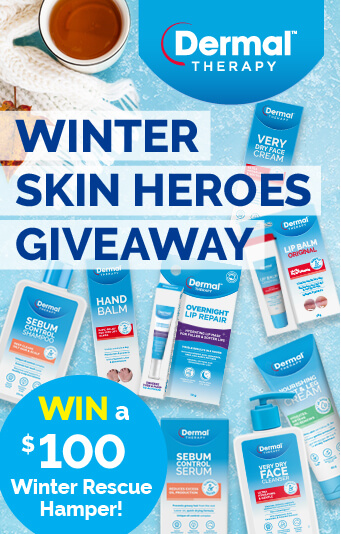 Promotional image set on a lighter icy blue background showcasing a selection of Dermal Therapy product packaging and text in navy, white and light yellow: Winter Skin Heroes Giveaway. Win a 0 winter rescue hamper