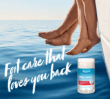 Two pairs of bare feet hanging over a boat above calm blue water with Dermal Therapy Heel Magic product shown and tagline "Foot care that loves you back".
