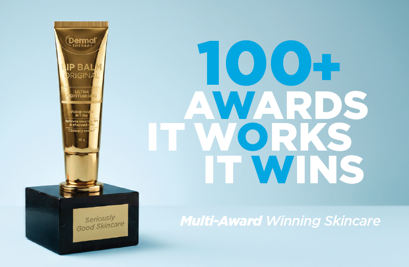 Dermal Therapy Lip Balm Original on an award trophy base with the text “100+ Awards It Works It Wins” and “Multi-Award Winning Skincare” on a light blue background.